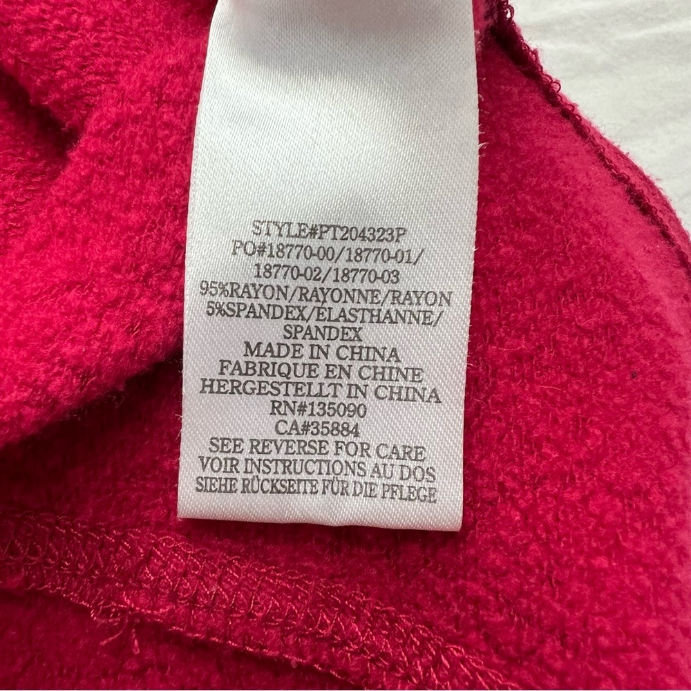 Peloton cranberry colored lightweight sweatshirt with multi-color brand name. - Picture 7 of 8